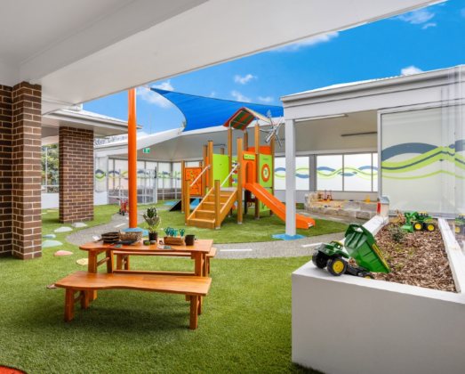 Outdoor play area with fort